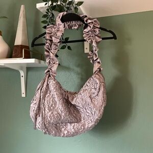 Damson Madder 

Ruched kidney shoulder bag in silver satin